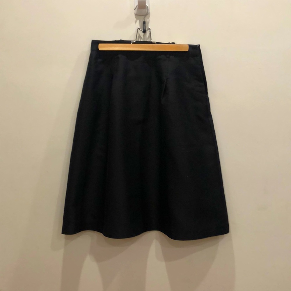 Black a-line skirt with pockets and side zip. C Wonder size 4